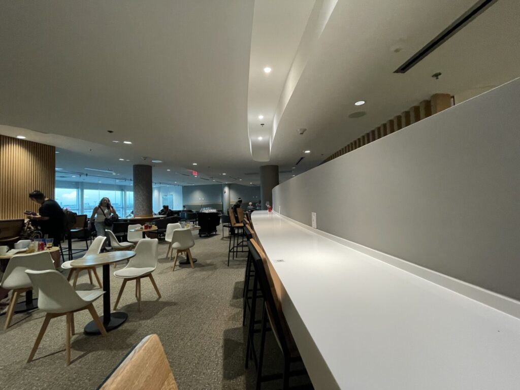 high top seating and cafe style seating within the avianca tap lounge in Miami