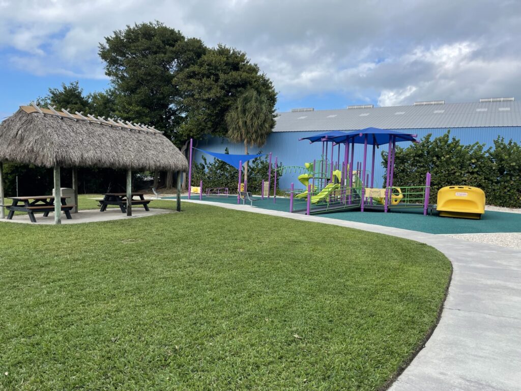 Playground and tiki hut shelter at Library Park Beach in islamorada