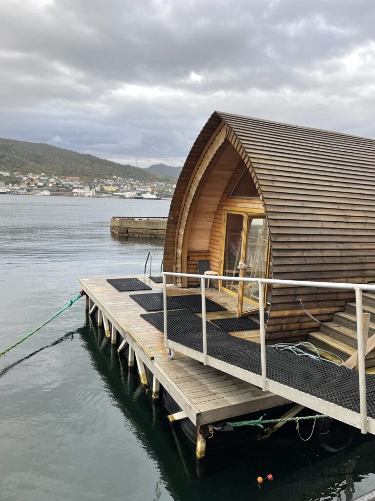 Sauna House in Bergen, Norway moored at a marina